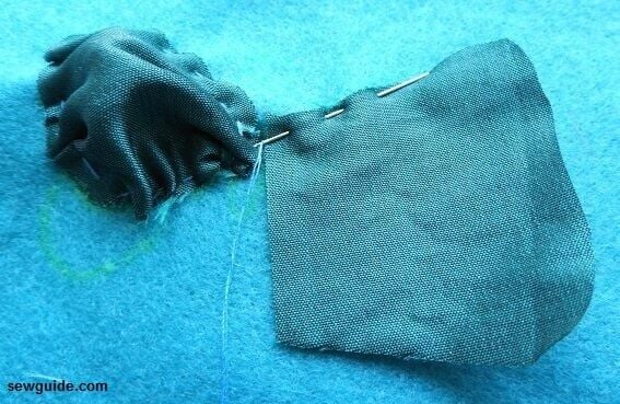 make gathering stitches and ruche fabric to fill the design