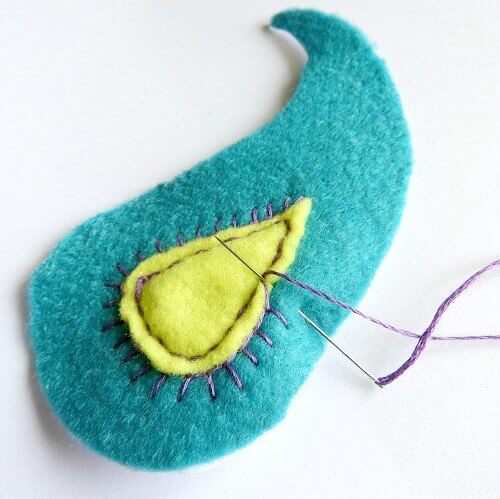 decorative stitches on the brooch