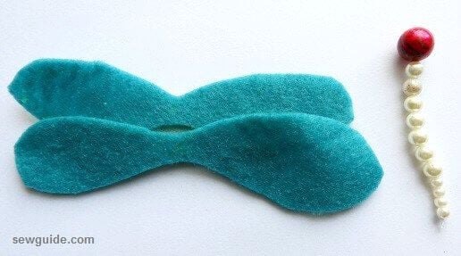 flet fabric used to cut the wings of the butterfly fabric brooch