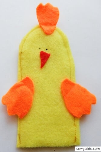Attach one petal on the head and two on the front