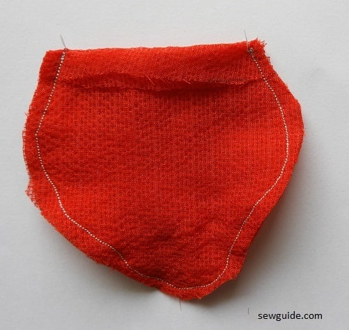 Apple shaped fabric sewn together
