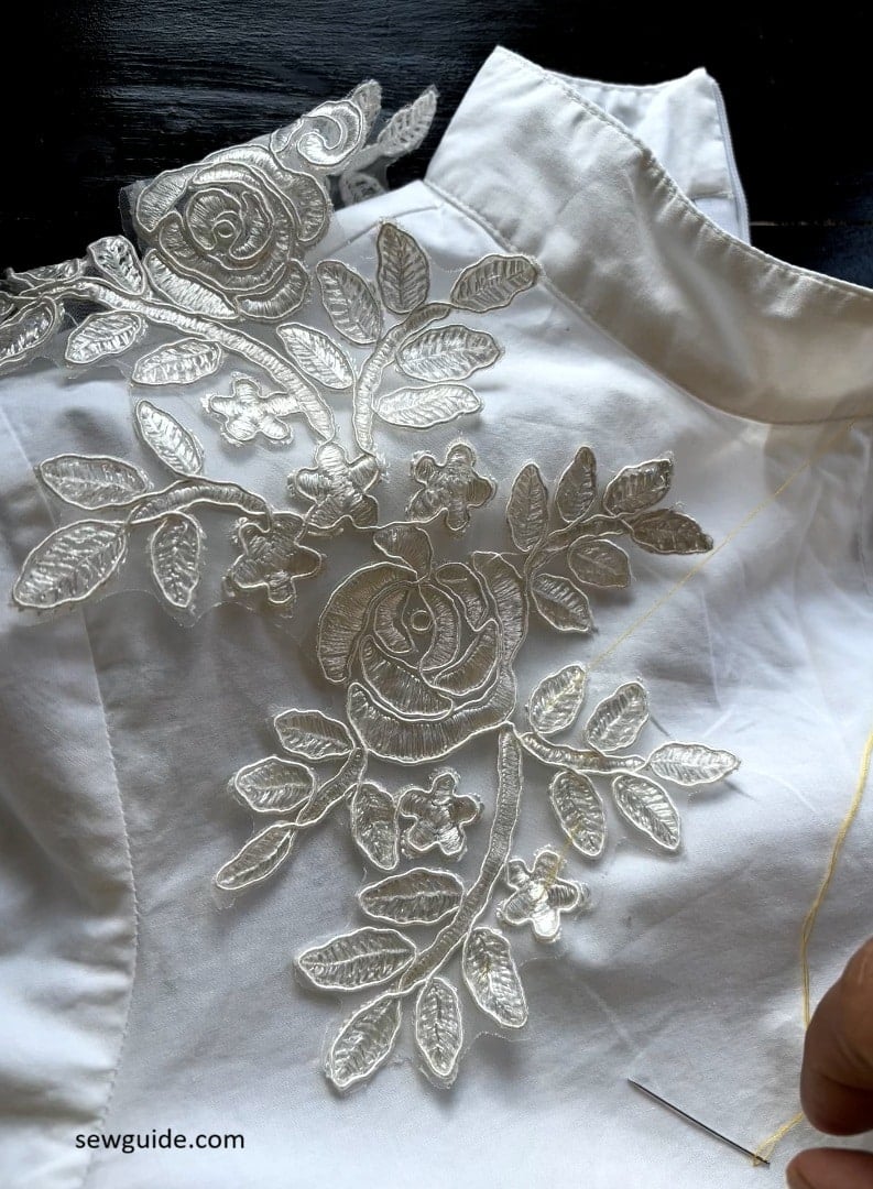 baste stitch the applique piece on the fabric with hand sewing needle and thread