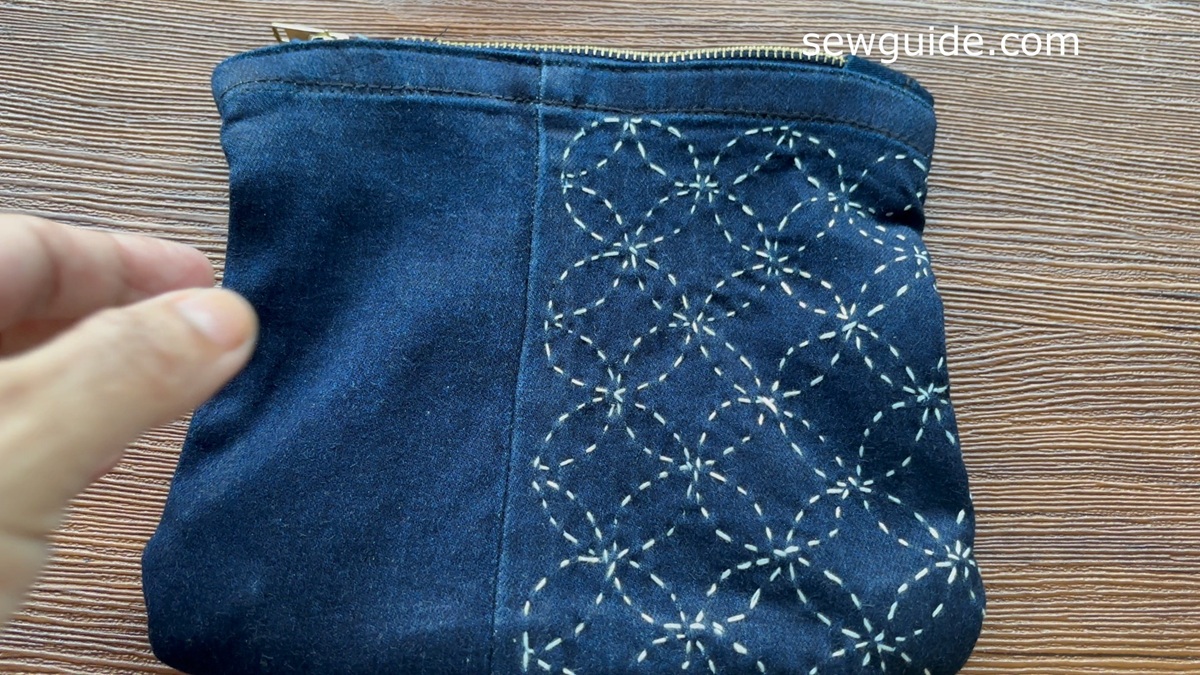 jeans pouch with sashiko embroidery and zippered opening