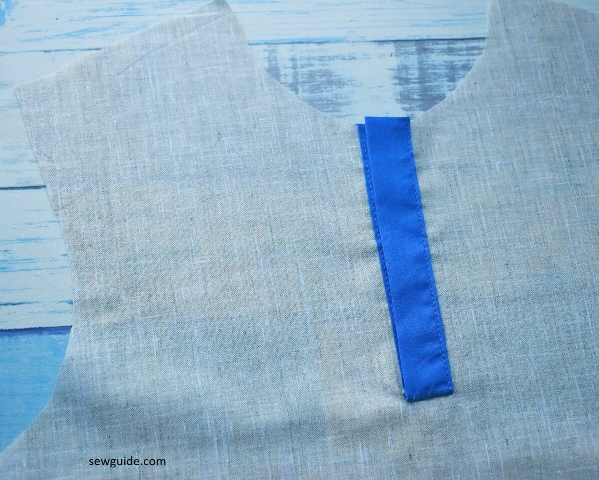 the slit placket for the neck
