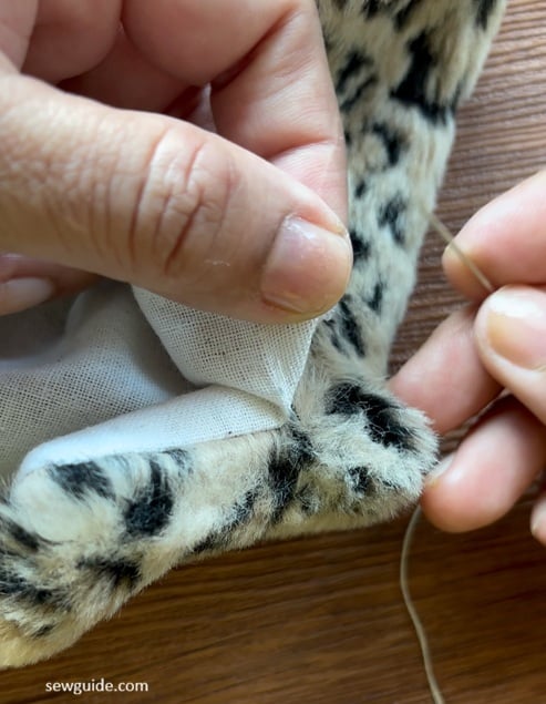 hand stitch the edges