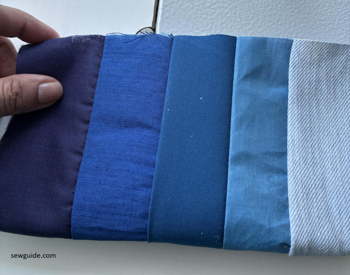 patchwork fabric made of different strips of blue color