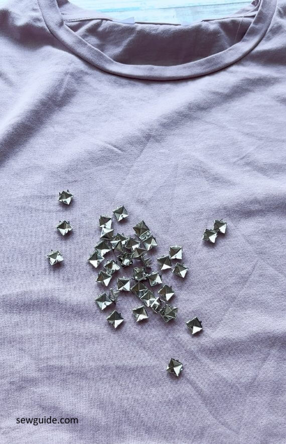 prong studs on a t shirt
