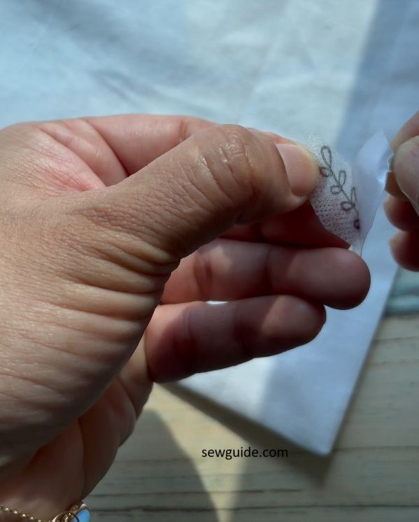 opening up the water soluble embroidery design 