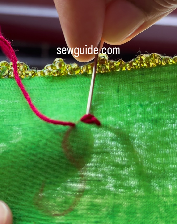 chain stitching on letter motif