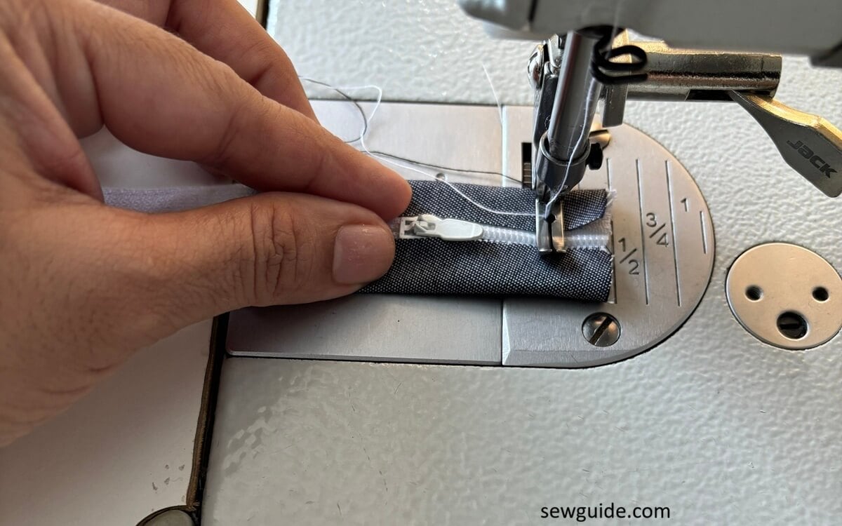 zipper end with fabric stitching