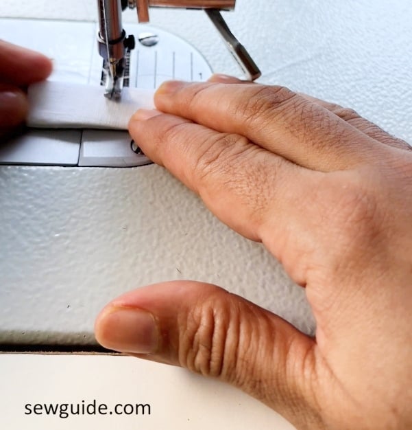 sew across the zipper tab