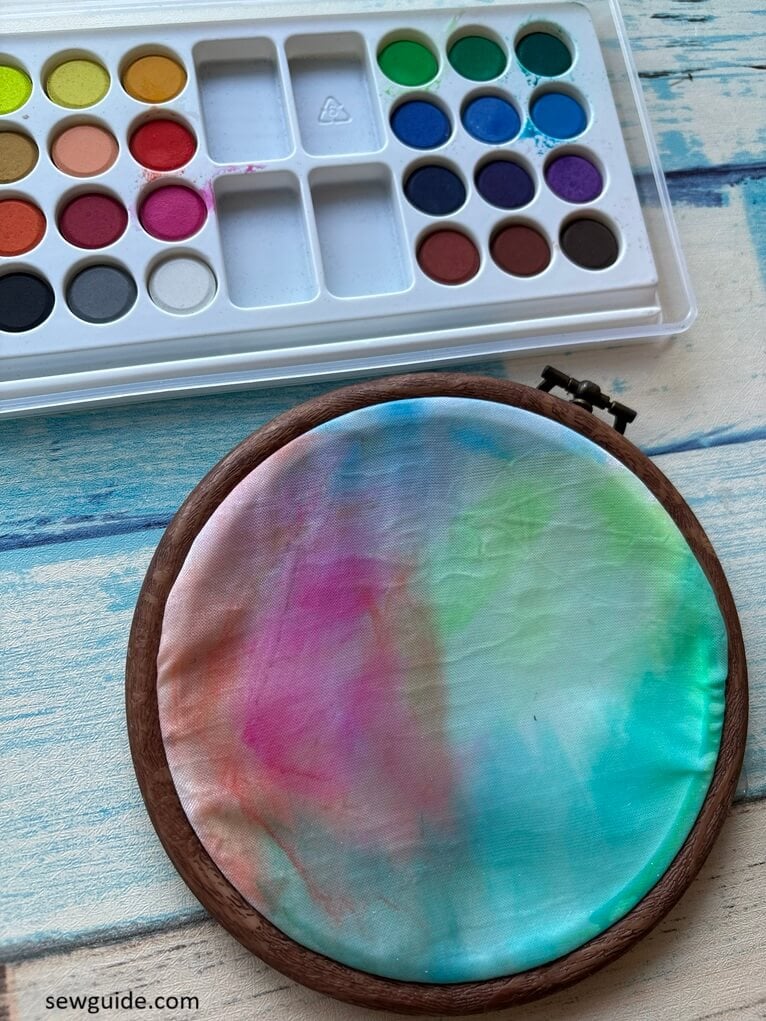 giving the fabric for embroidery a light wash
